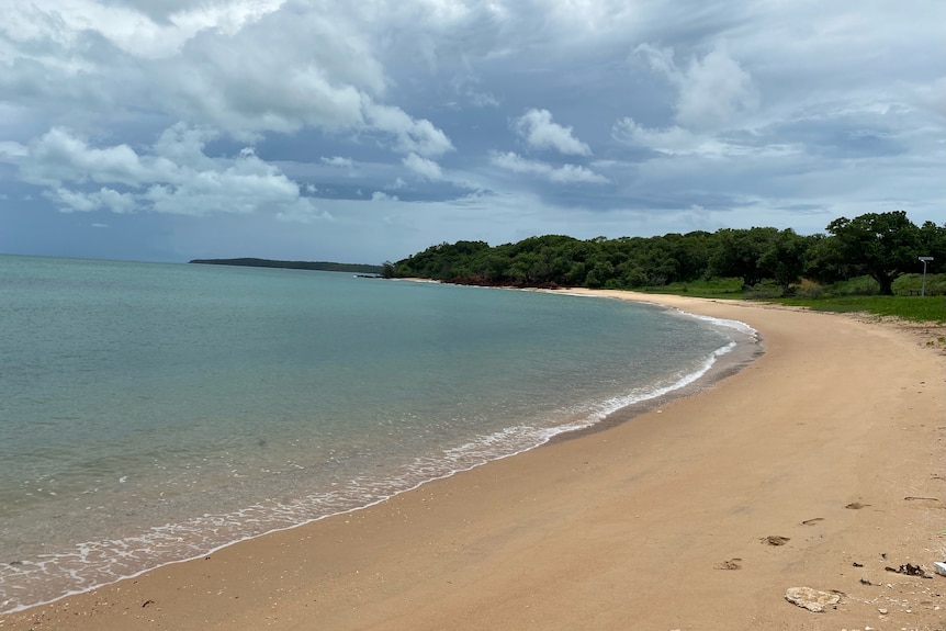 beach with clouds above