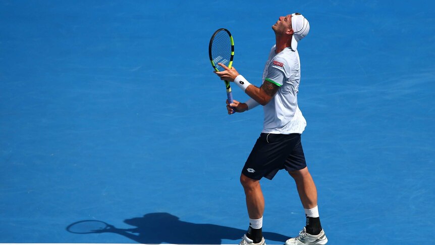 Sam Groth laments a miss against Andy Murray