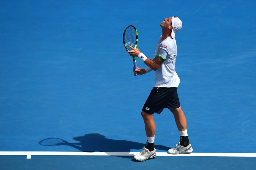 Sam Groth laments a miss against Andy Murray