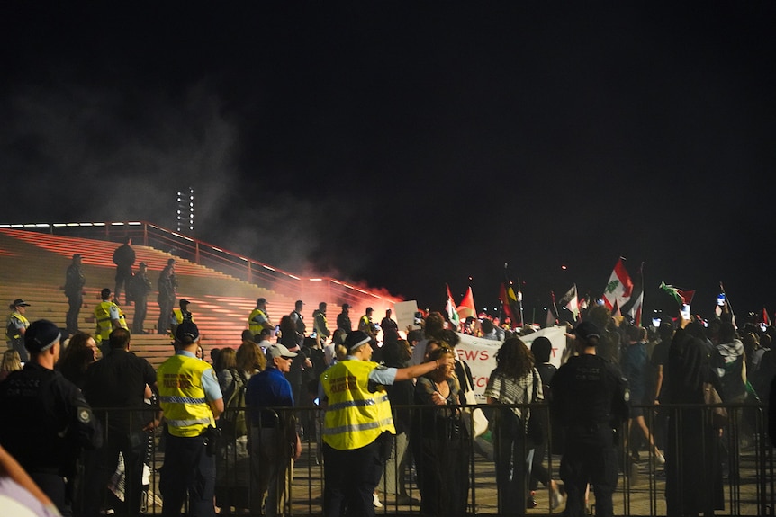 flares were let off at a pro-palestine rally on the opera house forecourt on monday october 9 