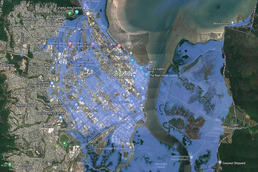 A satellite map of Cairns, with large parts of the city shaded in light blue, to represent sea level rises.