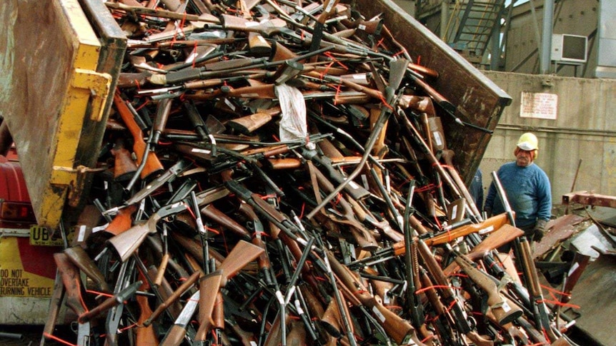 A truck unloads prohibited firearms at a scrap-metal yard in Sydney 2007