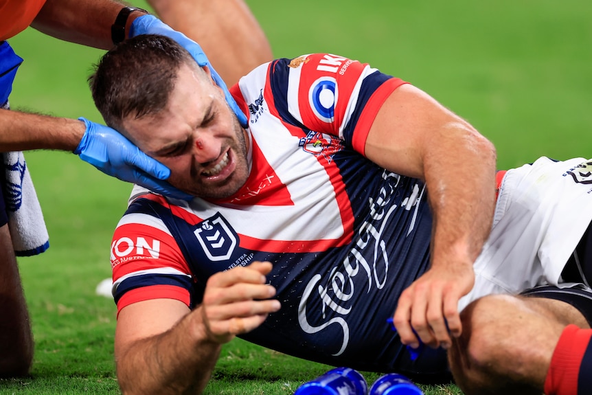 A Sydney Roosters NRL player is treated for concussion.