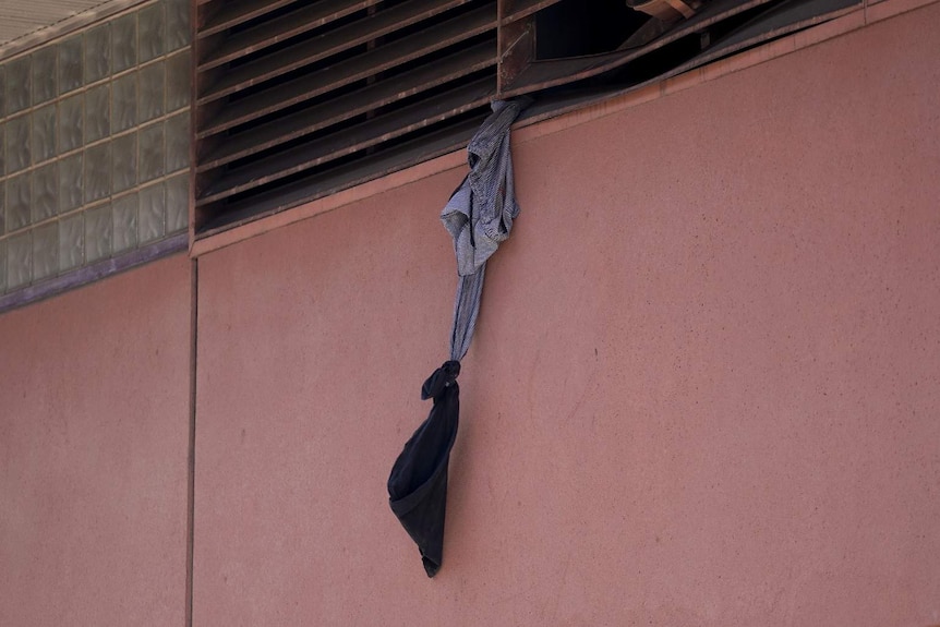 Items of clothing hanging from the Adelaide Remand Centre.