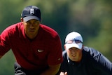 Tiger and Leishman line up putts
