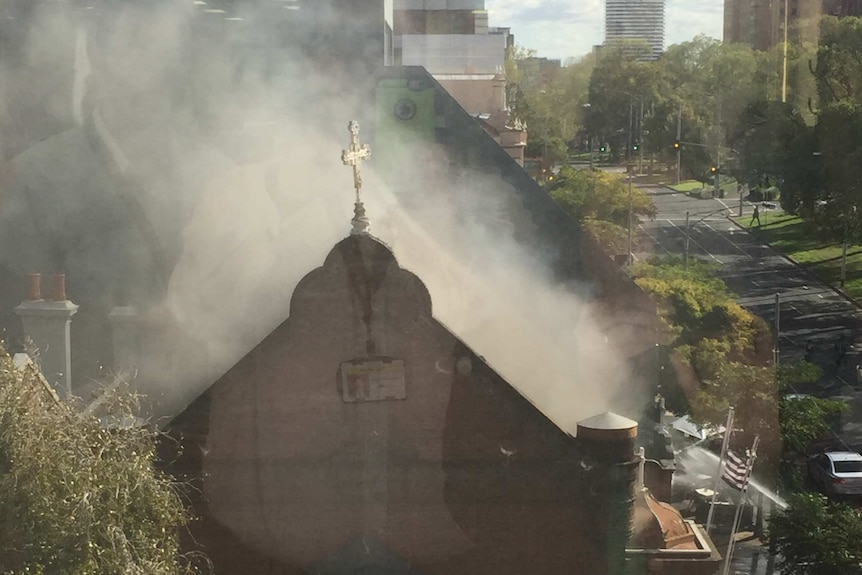 Fire crews on the scene of a church blaze at East Melbourne