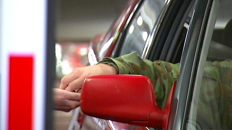 Motorist pays for city car park