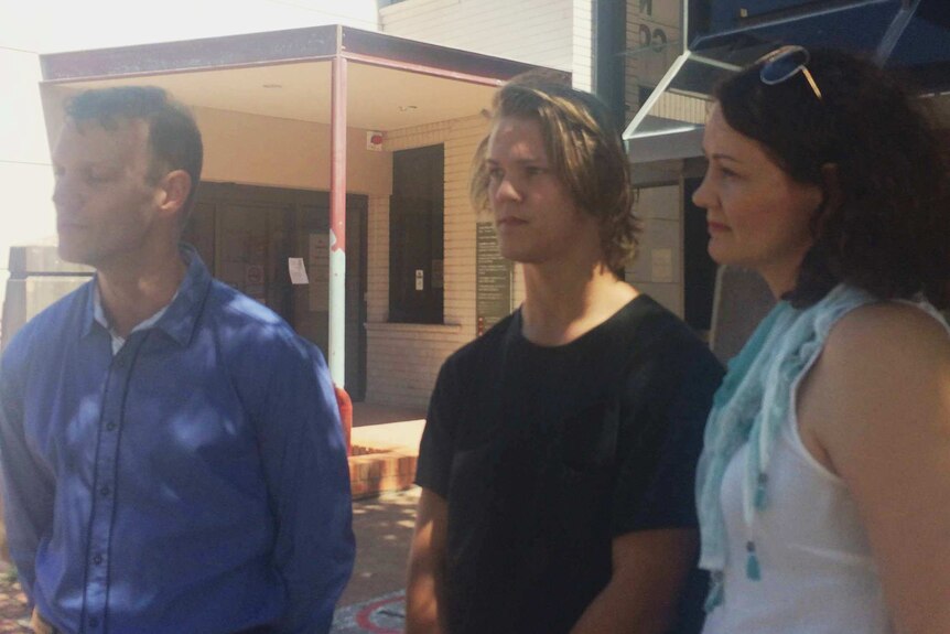Assault victim Jesse Chapman with his parents outside court.