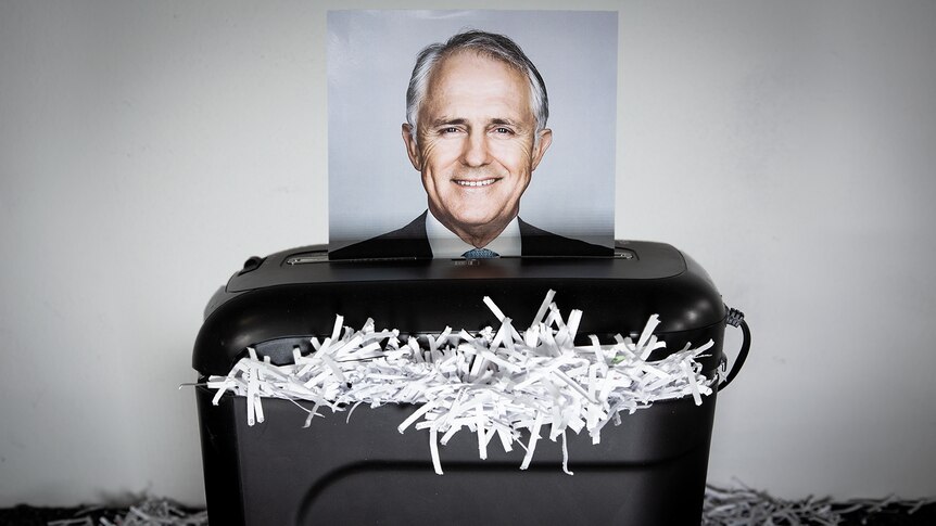 A photo of Malcolm Turnbull is in a paper shredder.