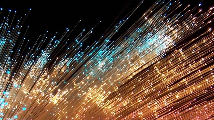 Light streams through fibre optic cables