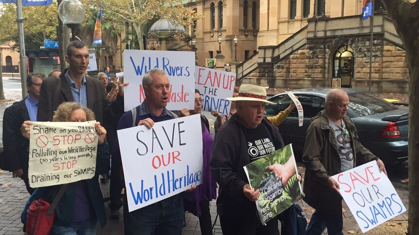 A group of anti-coal protesters outside the Land and Environment Court in Sydney.