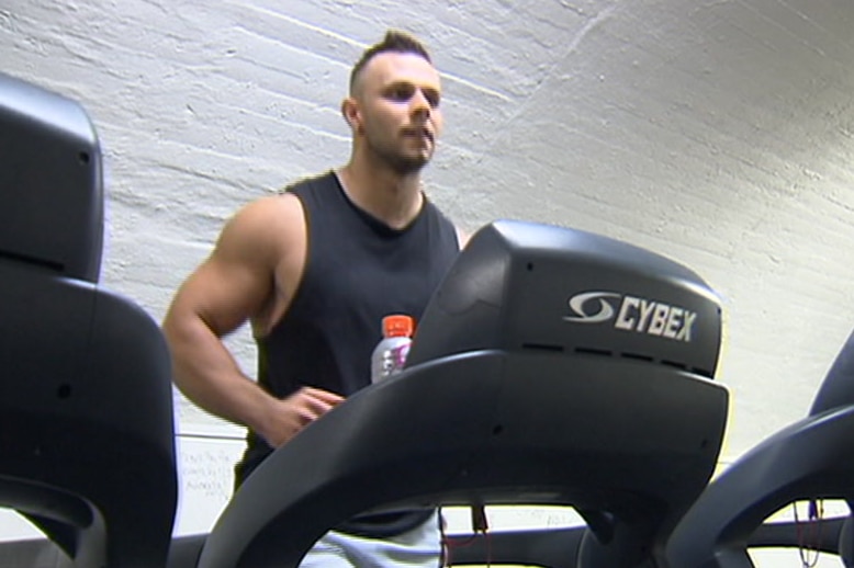 David Cicovic on a treadmill at Doherty's 24-hour gym.