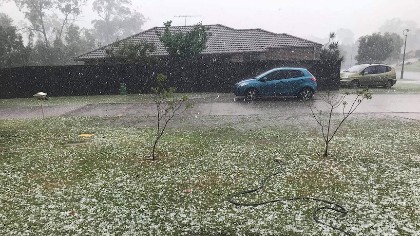 Hail falling on the ground at a house at Beaudesert, south of Brisbane.