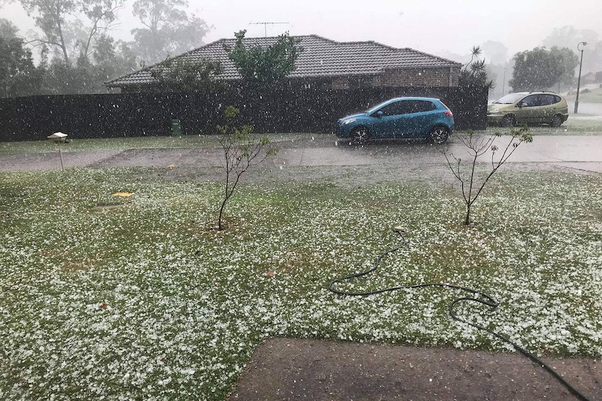 Hail falling on the ground at a house at Beaudesert, south of Brisbane.