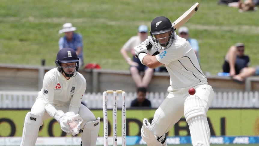 A New Zealand batsman watches the ball like a hawk as he prepares to smash it on the on-side.