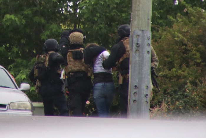 Police take person from siege house, Trevallyn