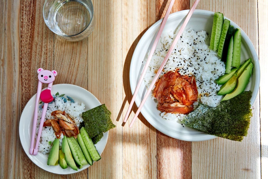 A kids and adults serving of a teriyaki chicken bowl, a nutritious and easy family dinner.