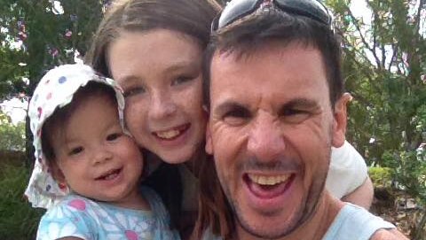 Reece Anderson with his daughters Eden and Belle