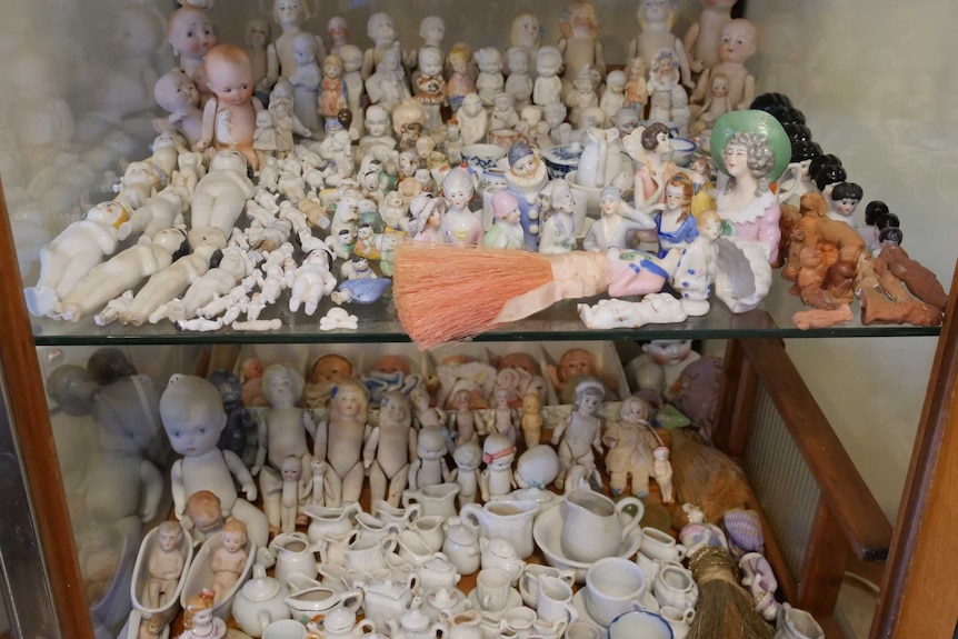 Small antique dolls as part of Margaret Edwards' extensive collection.