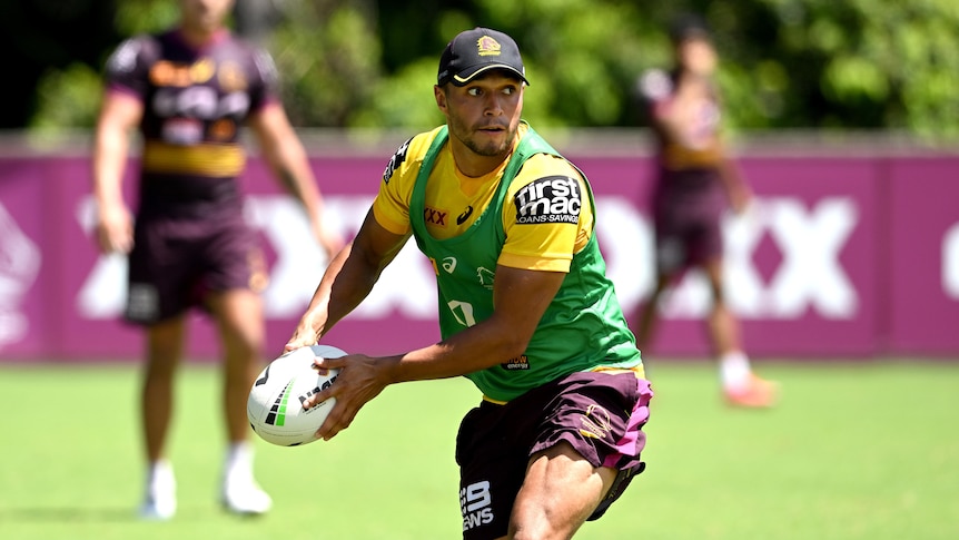 Te Maire Martin shapes to pass a football at training with NRL team the Brisbane Broncos.
