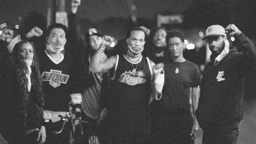Black and white photo of Anderson .Paak and fellow protestors in the artwork for 2020 single 'Lockdown'