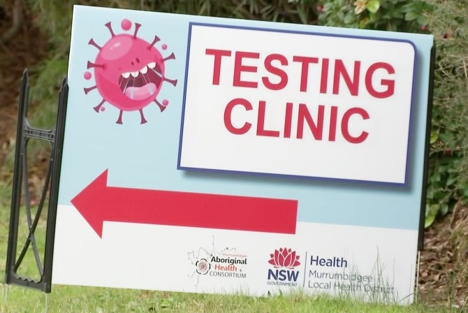 A sign saying testing clinic.