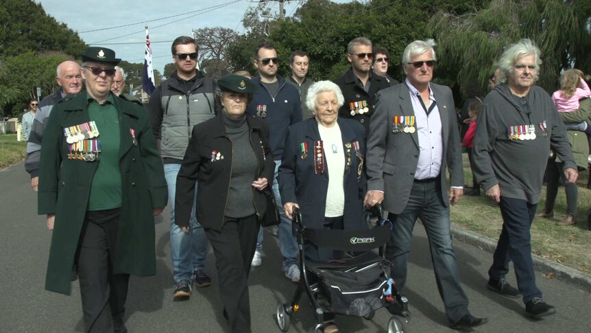 Phoebe Parker marching in the Frankston Anzac Parade with her family and friends