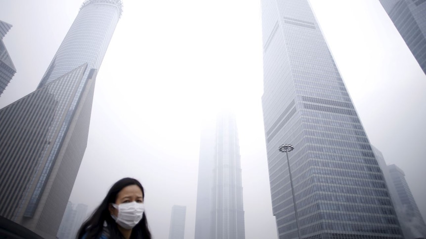 Smog in Beijing, China, people wearing masks, December 11, 2015