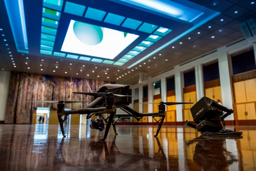 Drone on the floor of the Great Hall in Parliament House pre-flight during filming of The House with Annabel Crabb.