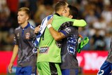 Jack Duncan and Dimitri Petratos celebrate Newcastle Jets' win over Sydney FC on March 3, 2018.