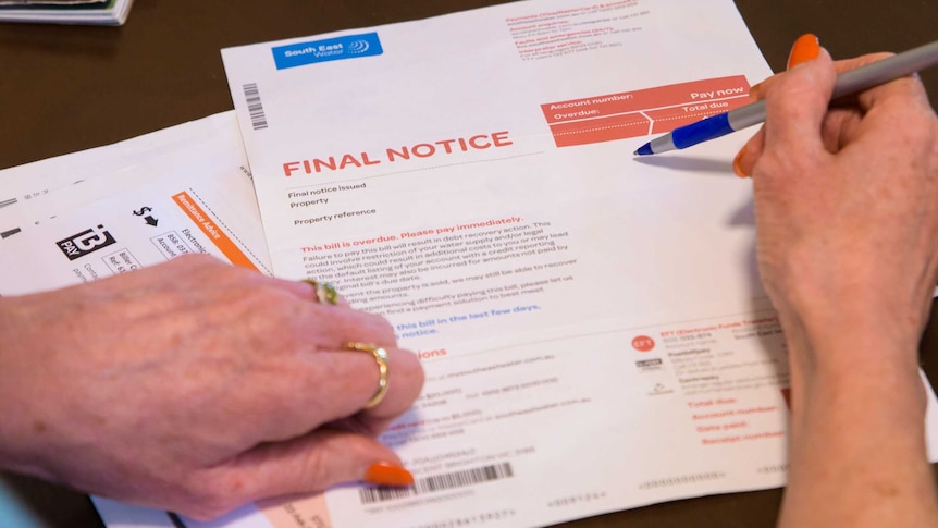 a photograph of a 'final notice' bill