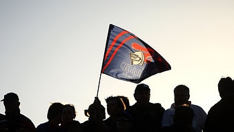 Newcastle Knights fans wave a flag for their team (Mark Kolbe/Getty Images)