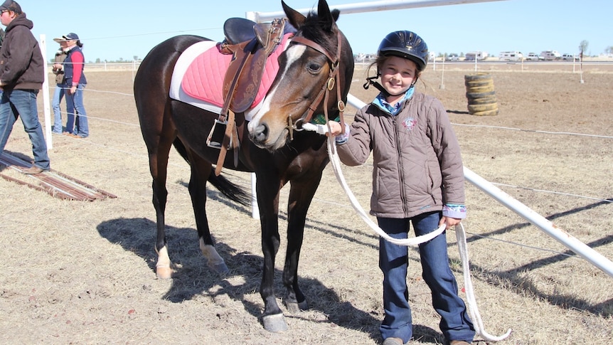Ella Severin and Diva, a brown pony named because she's "very picky about what saddle cloth she wore"