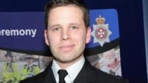 A profile photograph of Nick Bailey in uniform