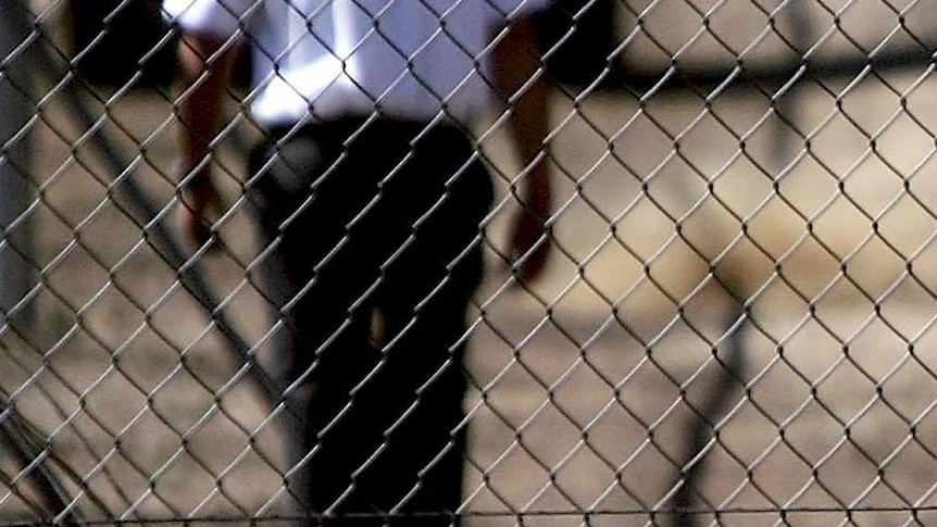 Security guards patrol the grounds at the Villawood Immigration Detention Centre