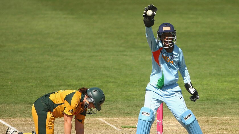 Karen Rolton is caught short of her ground by India keeper Anagha Deshpande.