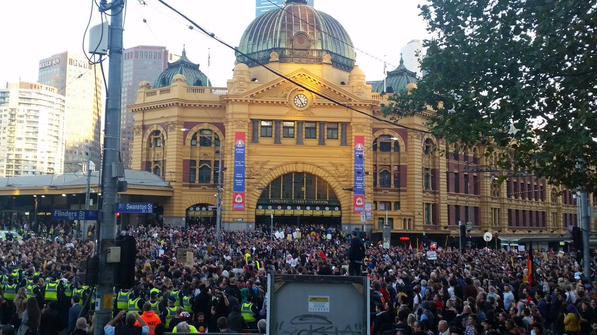 Wide shot of protest outside Flinders St Station
