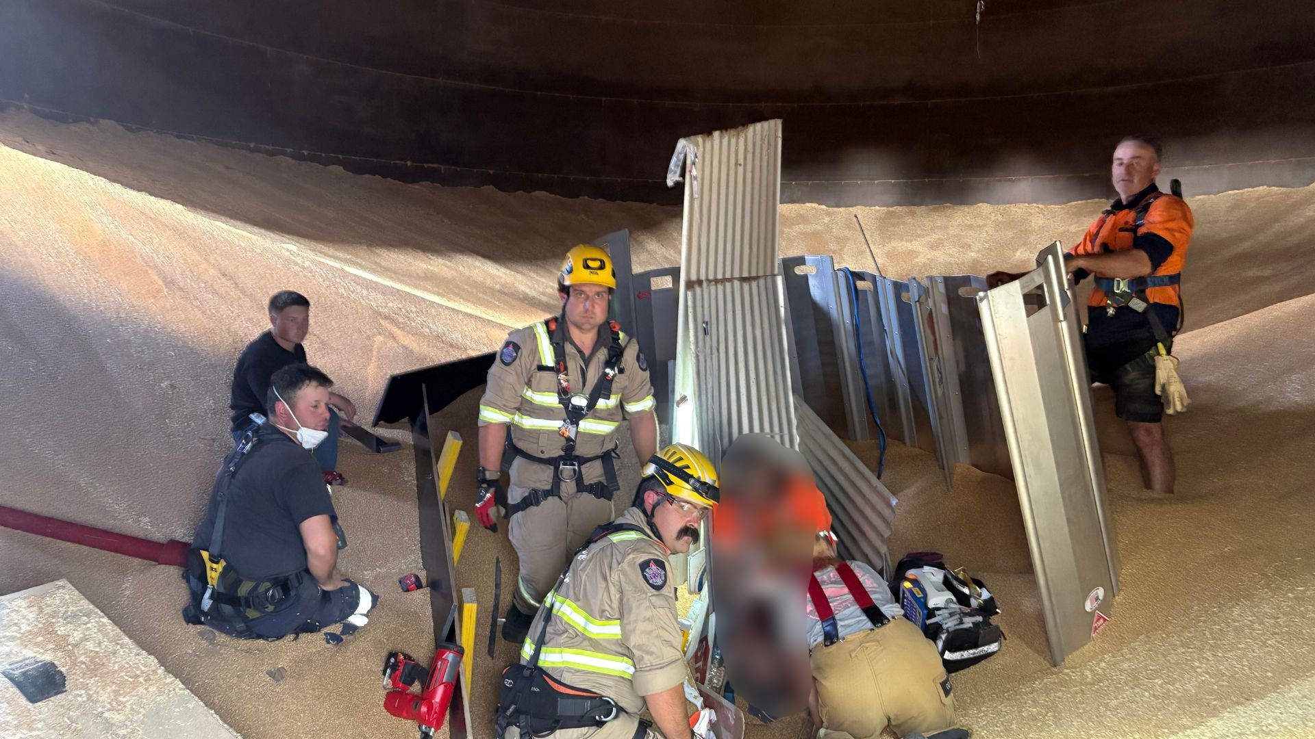 Rescuers detail life-saving operation to free worker from grain silo