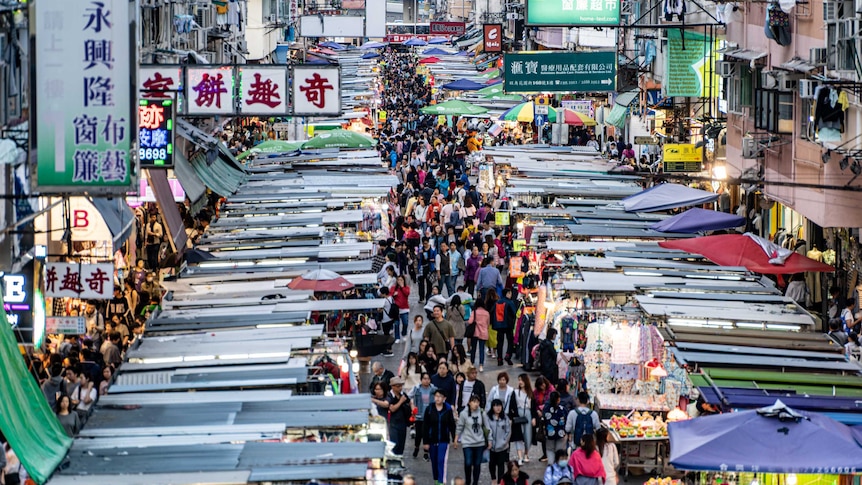 A photo of a bustling market place in Hong Kong