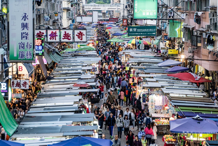A photo of a bustling market place in Hong Kong