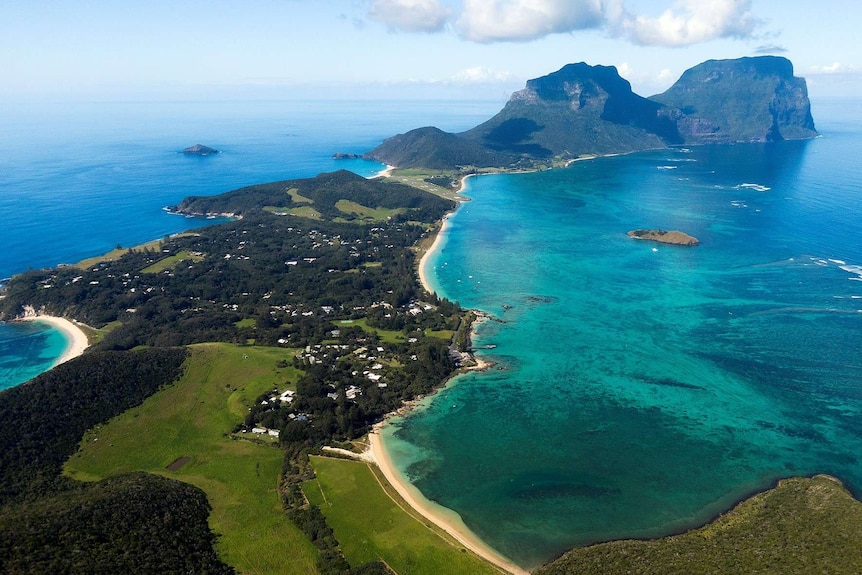 An aerial view of Lord How Island and surrounding turquoise waters.