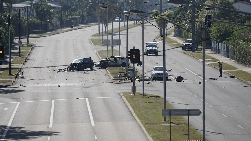 The Alawa crash as scene from a higher vantage point shows two crashed vehicles and debris across an intersection.