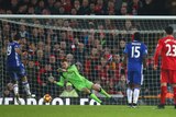Chelsea's Diego Costa (L) has a penalty saved by Liverpool's Simon Mignolet at Anfield.