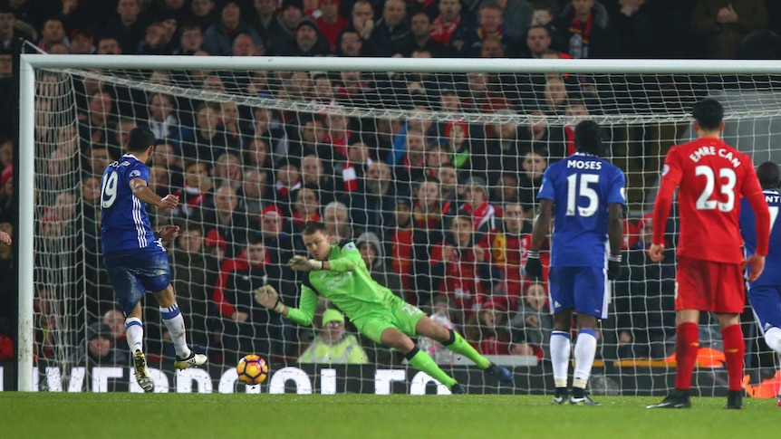 Chelsea's Diego Costa (L) has a penalty saved by Liverpool's Simon Mignolet at Anfield.