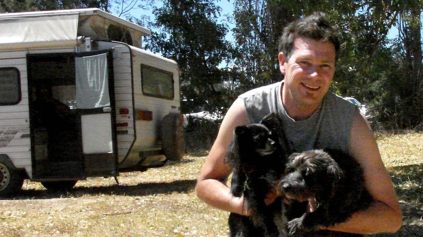 Peter Dowling with his dogs Coco (l) and Cody at the Alexandra Recovery Centre.