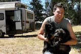 Peter Dowling with his dogs Coco (l) and Cody at the Alexandra Recovery Centre.