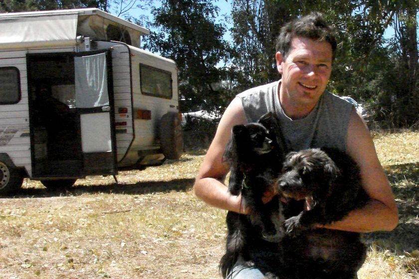 Peter Dowling with his dogs Coco (l) and Cody at the Alexandra Recovery Centre.