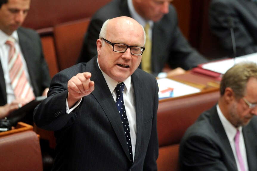 George Brandis speaks during Senate question time, February 25, 2013.