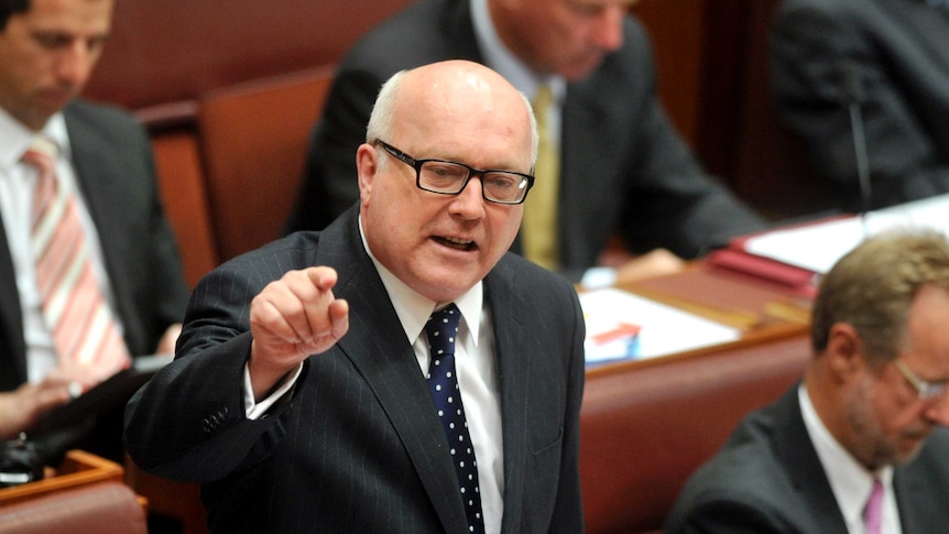 George Brandis speaks during Senate question time, February 25, 2013.