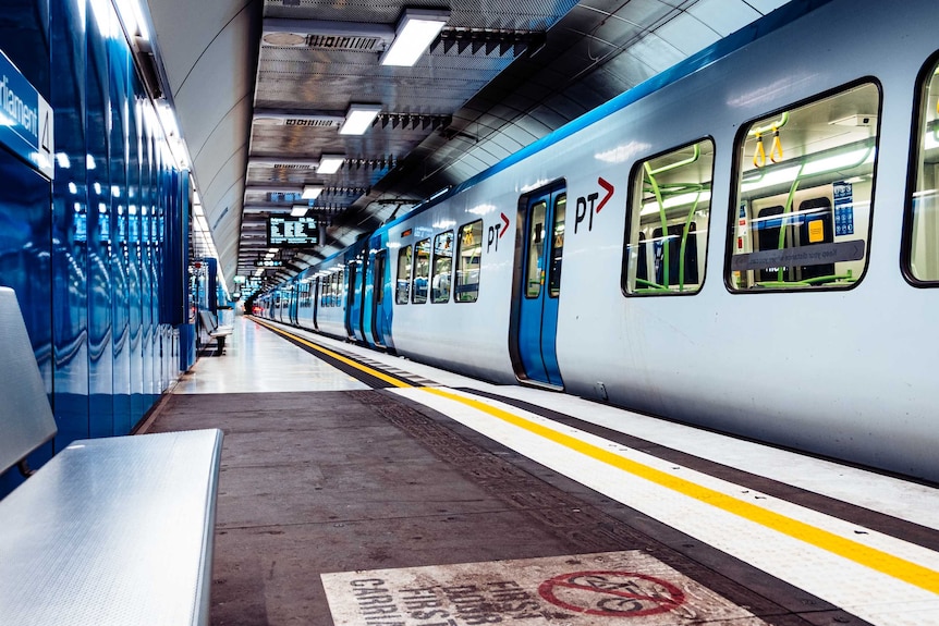 A Melbourne train stopped at the platform at Parliament station.